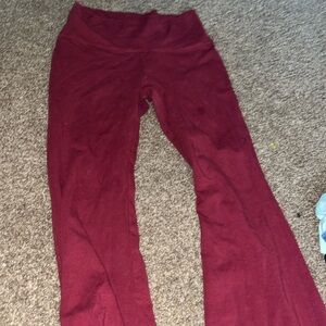 Wine red leggings , in size large